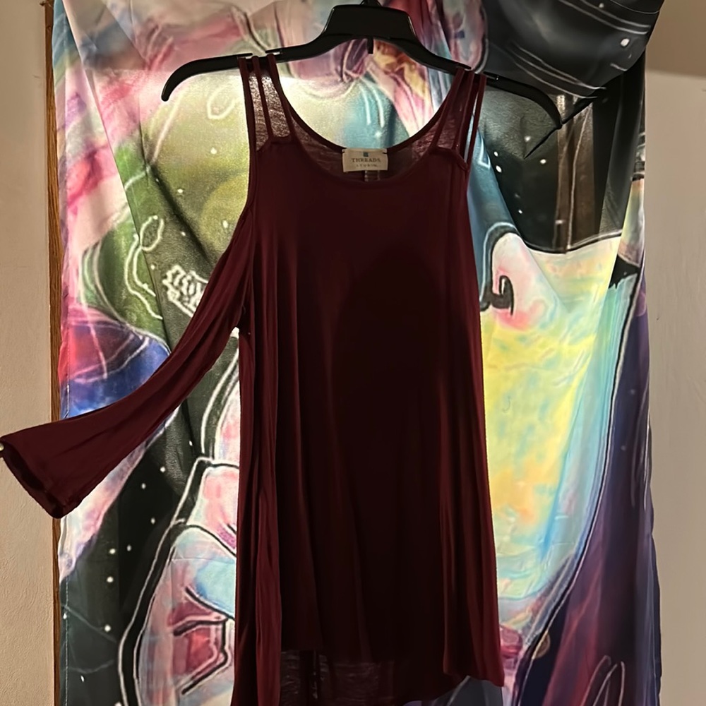 Very stylish maroon colored top!